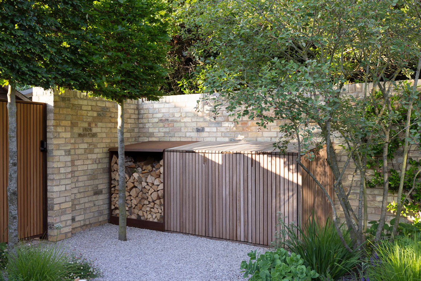Colm Joseph Cambridge courtyard garden design wood storage bin store