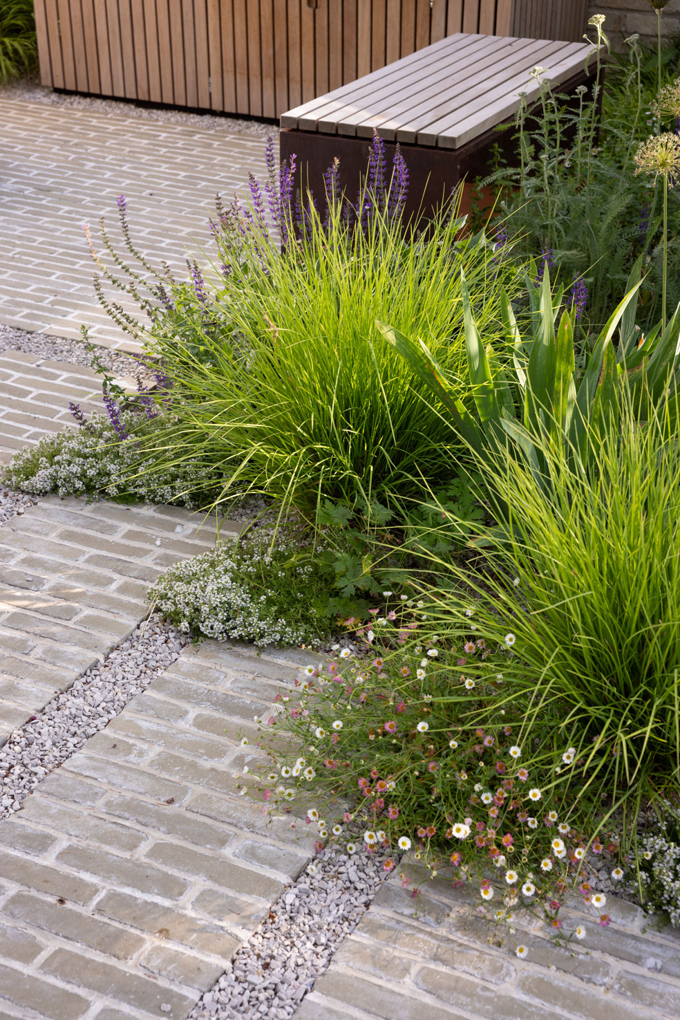 Colm Joseph Cambridge courtyard garden design bespoke bench clay pavers naturalistic planting