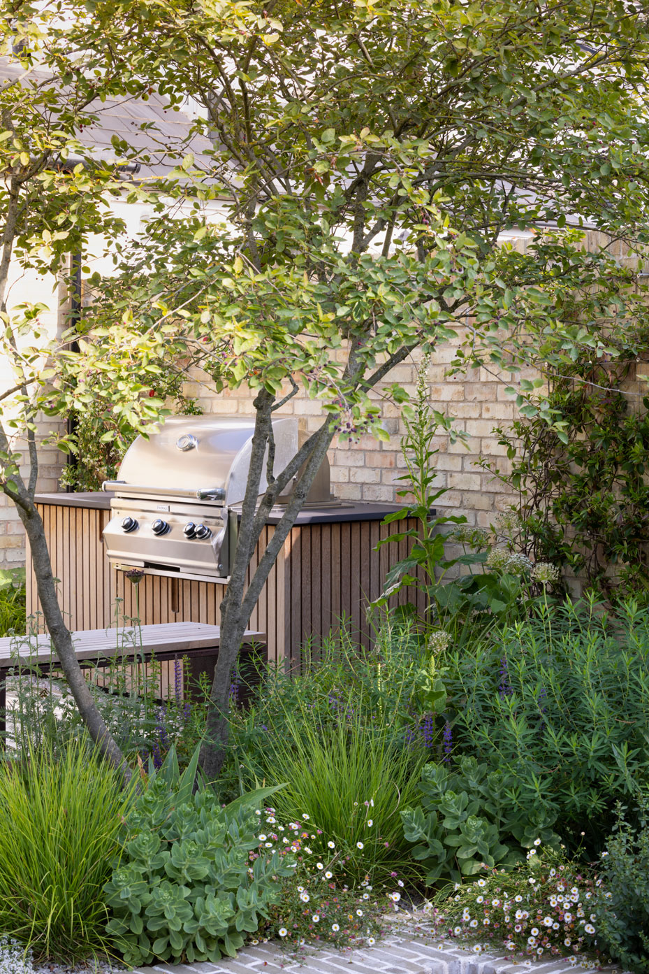 Colm Joseph Cambridge courtyard garden design outdoor cooking naturalistic planting
