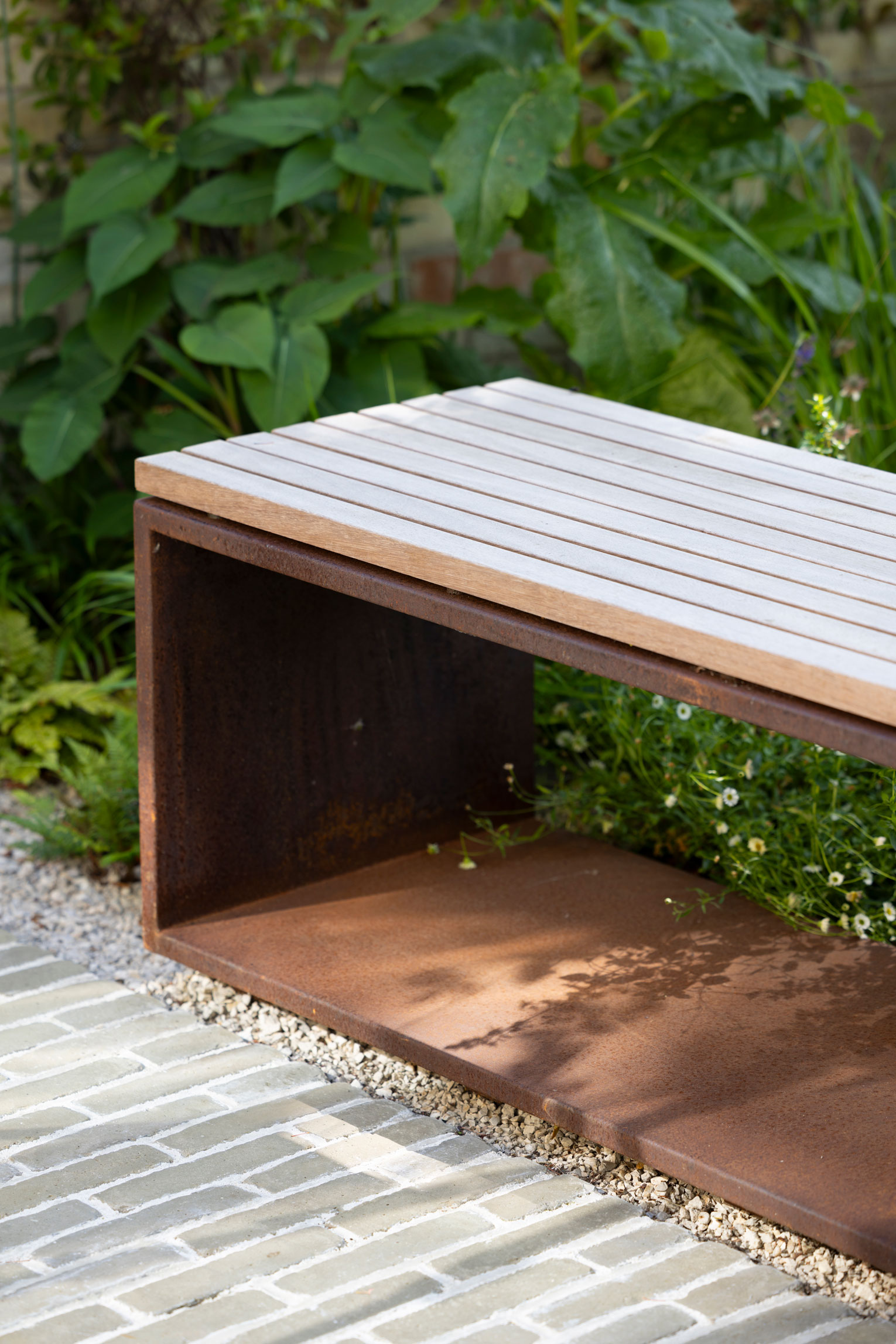 Colm Joseph Cambridge courtyard garden design bespoke bench weathered steel clay pavers