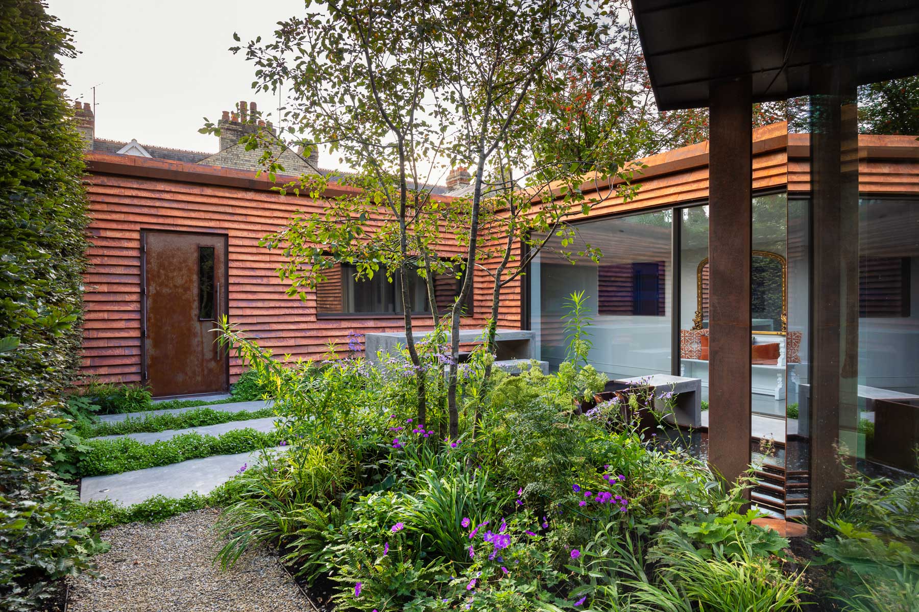 Colm Joseph Cambridge garden design modern architecture courtyard naturalistic perennial planting multi-stem crab apple tree